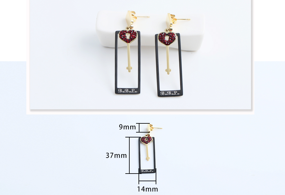 Heart-shaped key black frame earrings