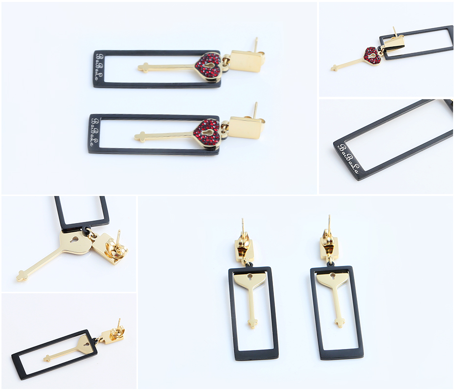 Heart-shaped key black frame earrings