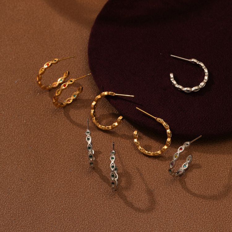 Stainless steel wave patterned diamond earrings